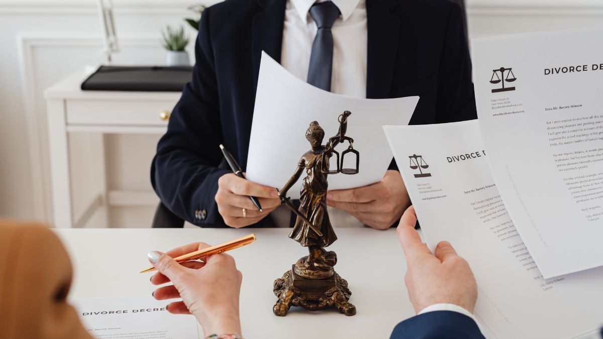 Attorney of divorce is checking and assessing divorce real estate documents.